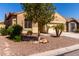 Charming single-story home with a well-maintained front yard and desert landscaping at 346 E Red Mesa Trl, San Tan Valley, AZ 85143