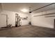 Spacious garage with ample room for parking and storage, featuring a sealed concrete floor at 346 E Red Mesa Trl, San Tan Valley, AZ 85143