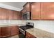 Spacious kitchen featuring granite counters, white subway tile backsplash, and stainless steel appliances at 346 E Red Mesa Trl, San Tan Valley, AZ 85143