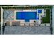 Aerial view of a luxurious backyard featuring a pool, spa, and pergola, creating an oasis for outdoor living at 3483 E Bloomfield Pkwy, Gilbert, AZ 85296