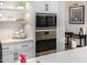 Gourmet kitchen with built-in stainless steel microwave and oven at 3483 E Bloomfield Pkwy, Gilbert, AZ 85296