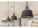 Close up of modern farmhouse pendant lights in the kitchen at 3483 E Bloomfield Pkwy, Gilbert, AZ 85296