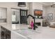 Kitchen with stainless steel faucet, farmhouse sink, and island at 3483 E Bloomfield Pkwy, Gilbert, AZ 85296