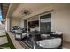 Spacious covered patio featuring outdoor furniture, ceiling fan and an indoor/outdoor living concept at 3483 E Bloomfield Pkwy, Gilbert, AZ 85296