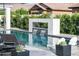 Inviting pool featuring a modern waterfall feature and lounge chairs, perfect for relaxation and outdoor enjoyment at 3483 E Bloomfield Pkwy, Gilbert, AZ 85296