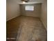 Bedroom featuring a ceiling fan, carpeted floor, and a window at 3520 N 85Th St, Scottsdale, AZ 85251