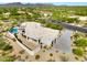 Neutral color scheme with mature landscaping, four car garage, pool, and desert landscape at 35348 N 87Th St, Scottsdale, AZ 85266