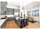 Spacious kitchen with grey cabinetry, stainless steel appliances, marble countertops, and a stylish kitchen island at 35348 N 87Th St, Scottsdale, AZ 85266