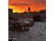 Comfortable outdoor seating area with modern furniture and sunset views for relaxing evenings at 35348 N 87Th St, Scottsdale, AZ 85266