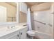 Full bathroom features white vanity, and tiled bathtub with shower at 3690 N 150Th Ave, Goodyear, AZ 85395