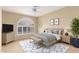 Comfortable main bedroom with ample natural light, a soft color scheme, and stylish decor at 3690 N 150Th Ave, Goodyear, AZ 85395