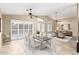 Open dining area with ample seating, perfect for entertaining and Gathering gatherings, enhanced by bright natural light at 3690 N 150Th Ave, Goodyear, AZ 85395
