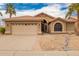 Charming single-story home showcasing a well-maintained yard, palm trees, and a two-car garage at 3690 N 150Th Ave, Goodyear, AZ 85395