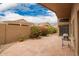 Private backyard featuring a tiled patio area with barbecue grill at 3690 N 150Th Ave, Goodyear, AZ 85395