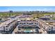 Aerial view showcasing a community with modern townhomes, pool area, and lush landscaping at 377 E Windsor Ave # 4, Phoenix, AZ 85004