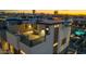 Stunning aerial view showcasing the rooftop patio with a dining area and city views at 377 E Windsor Ave # 4, Phoenix, AZ 85004