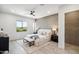 Stylish bedroom featuring a modern bed, brick accent wall, and ample natural light at 377 E Windsor Ave # 4, Phoenix, AZ 85004
