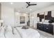 Bright bedroom with light walls, tile floor, recessed lighting, a ceiling fan, and modern decor at 377 E Windsor Ave # 4, Phoenix, AZ 85004