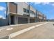 Contemporary townhome exterior with modern design elements, featuring a private entrance and garage at 377 E Windsor Ave # 4, Phoenix, AZ 85004