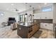 Bright kitchen with an island, stainless appliances, pendant lights and open floor plan at 377 E Windsor Ave # 4, Phoenix, AZ 85004