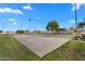 Community basketball court with gorgeous green space surrounding the play area and ample room for activities at 393 S Soledad Ln, Casa Grande, AZ 85194