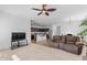 Open floor plan showcasing living room, dining area, and kitchen, seamlessly integrated for modern living at 393 S Soledad Ln, Casa Grande, AZ 85194