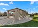 Community picnic area with shade and bbq grill for entertaining and enjoying time outside at 393 S Soledad Ln, Casa Grande, AZ 85194