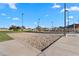 Community sand volleyball court for a friendly game in the neighborhood with surrounding green space at 393 S Soledad Ln, Casa Grande, AZ 85194