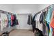 Spacious walk-in closet featuring ample hanging space for clothes and accessories at 393 S Soledad Ln, Casa Grande, AZ 85194
