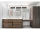 Bathroom with double sink vanity, make up station, and bright lighting at 4010 E Montebello Ave, Phoenix, AZ 85018