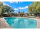 Inviting backyard pool surrounded by lush landscaping, perfect for swimming and relaxation on sunny days at 4010 E Montebello Ave, Phoenix, AZ 85018