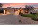 Charming single-story home featuring a three-car garage and well-maintained landscaping at 4614 W Fallen Leaf Ln, Glendale, AZ 85310