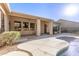 Relaxing pool and patio area with a covered space to enjoy the beautiful backyard oasis at 4614 W Fallen Leaf Ln, Glendale, AZ 85310