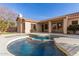 Beautiful pool and spa area with a covered patio, perfect for relaxing and entertaining at 4614 W Fallen Leaf Ln, Glendale, AZ 85310