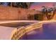 Backyard spa with decorative tile and block wall at 4614 W Fallen Leaf Ln, Glendale, AZ 85310