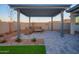 Inviting patio featuring a pergola, outdoor seating, and scenic views, perfect for relaxing and enjoying the outdoors at 4924 W Capistrano Ave, Laveen, AZ 85339
