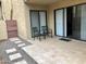Inviting patio with tiled flooring and outdoor seating at 4950 N Miller Rd # 122, Scottsdale, AZ 85251