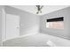 Bright room with tile flooring, a ceiling fan, and a window providing natural light at 5228 W Ironwood Dr, Glendale, AZ 85302