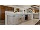 Bar area with decorative cabinets, counter top and wine storage, perfect for entertaining at 5480 E Desert Creek Ln, Cave Creek, AZ 85331