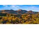 Desert community nestled in the mountains with desert landscaping and beautiful homes at 5480 E Desert Creek Ln, Cave Creek, AZ 85331
