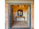 Elegant foyer with a decorative table, chandelier, sconces, and tile floor at 5480 E Desert Creek Ln, Cave Creek, AZ 85331