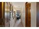 Hallway featuring custom storage cabinets, and decorative accents at 5480 E Desert Creek Ln, Cave Creek, AZ 85331