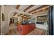 Bright kitchen featuring custom island, white cabinetry and black countertops at 5480 E Desert Creek Ln, Cave Creek, AZ 85331