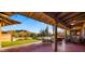 Charming patio overlooking a putting green and the desert landscape at 5480 E Desert Creek Ln, Cave Creek, AZ 85331