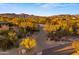 Desert neighborhood street with desert landscaping and beautiful homes at 5480 E Desert Creek Ln, Cave Creek, AZ 85331