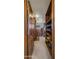 Walk-in closet with custom shelving and drawers for ample storage at 5480 E Desert Creek Ln, Cave Creek, AZ 85331