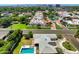 An aerial shot captures a home's location and neighborhood amenities, including a pool at 5501 N 1St St, Phoenix, AZ 85012