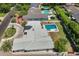 The aerial view shows a home with a private pool, landscaping, and circular driveway at 5501 N 1St St, Phoenix, AZ 85012