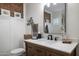 Stylish bathroom with a modern vanity, a sleek mirror, and chic decor for a sophisticated ambiance at 5501 N 1St St, Phoenix, AZ 85012