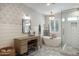 Spa-like bathroom with tub, glass shower, patterned wallpaper, and stylish vanity area at 5501 N 1St St, Phoenix, AZ 85012